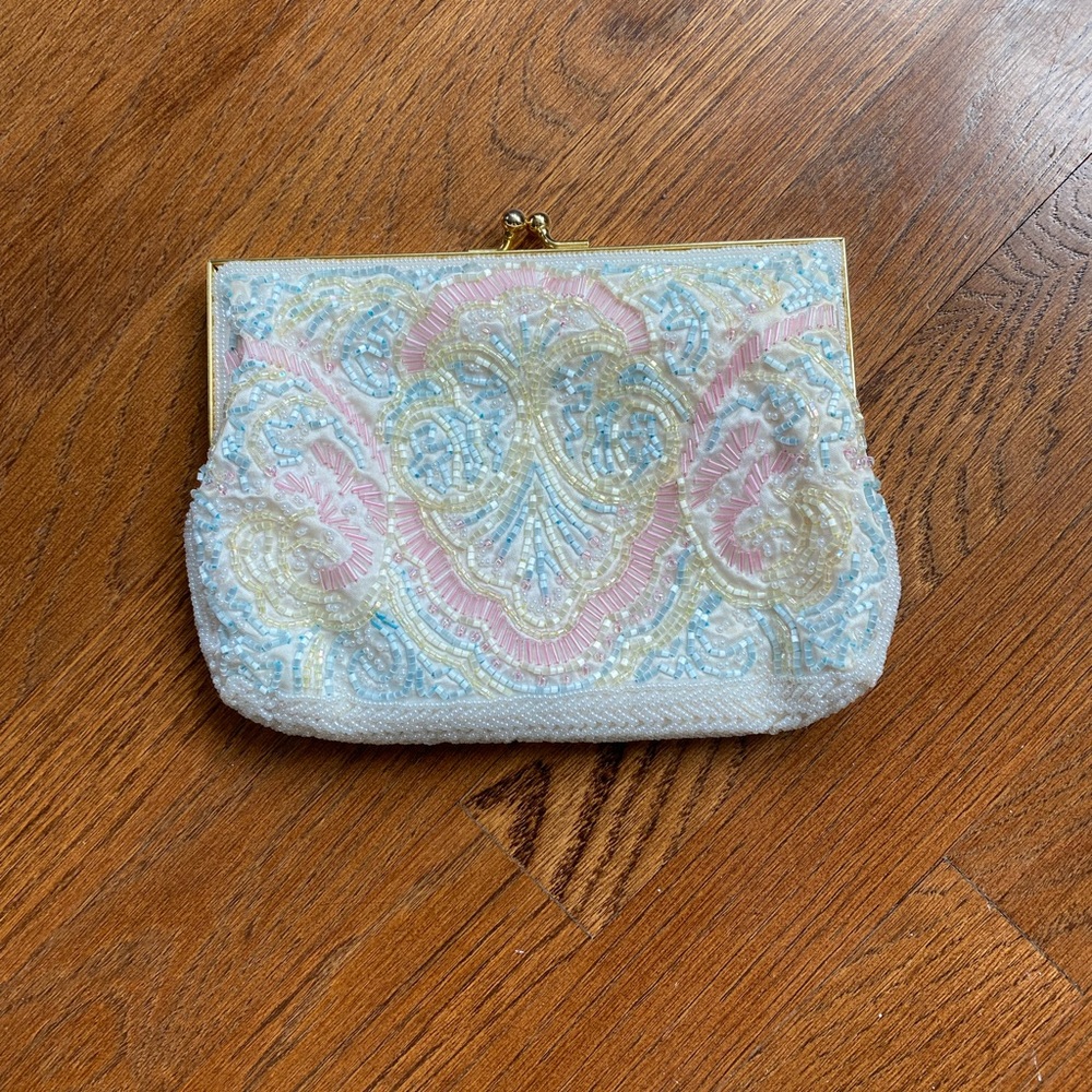 Gorgeous beaded Andre Cellin clutch. Also comes with a gold strap.